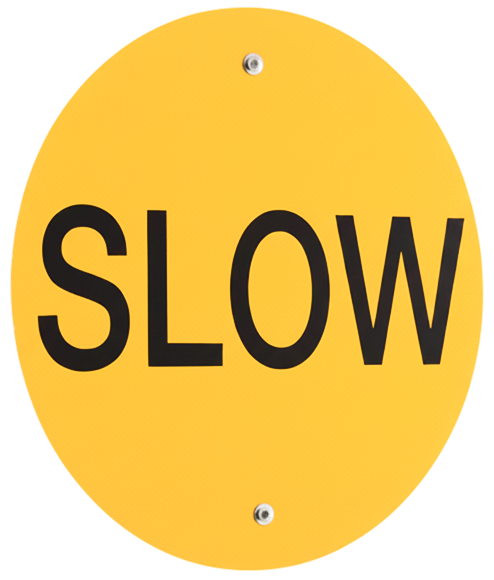 Yellow circular sign: SLOW